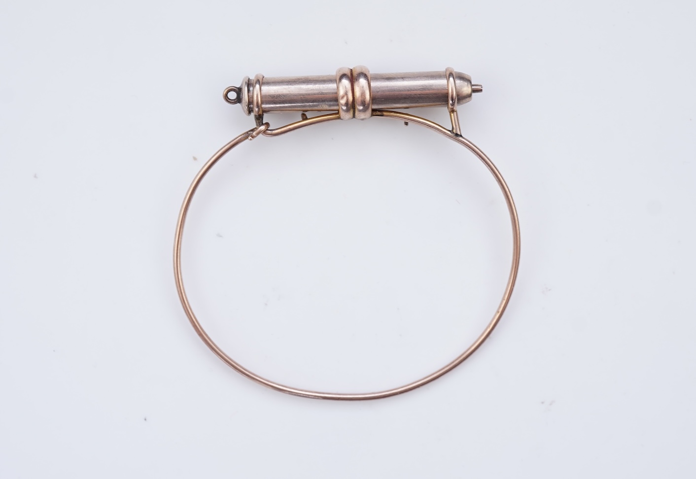 A gold bracelet and propelling pencil, first half 20th century